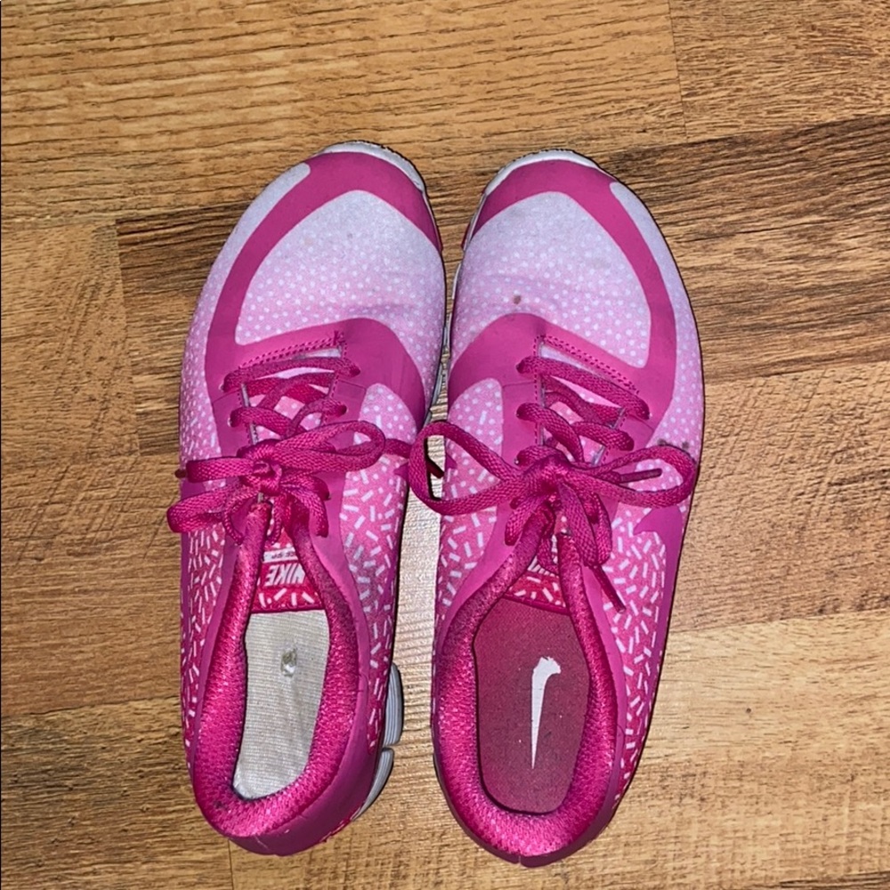Slightly worn pink nike sneakers